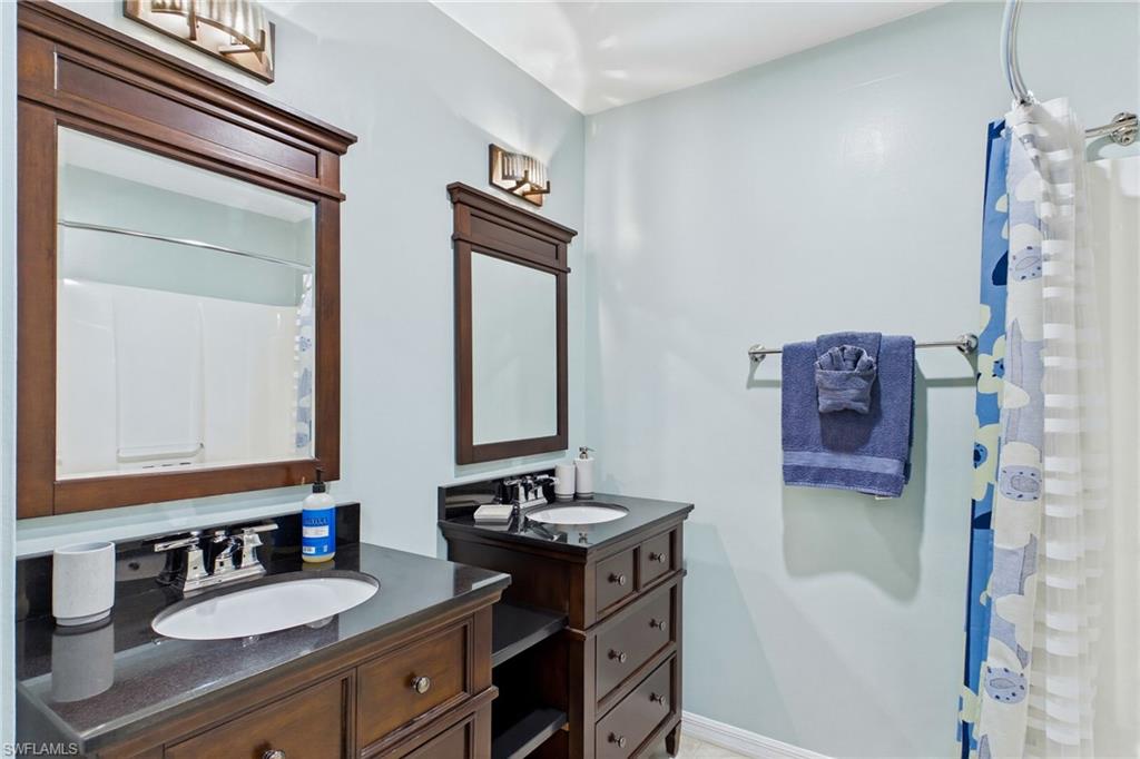 Guest bathroom with lots of storage, dual sinks and located between the two guest bedrooms!