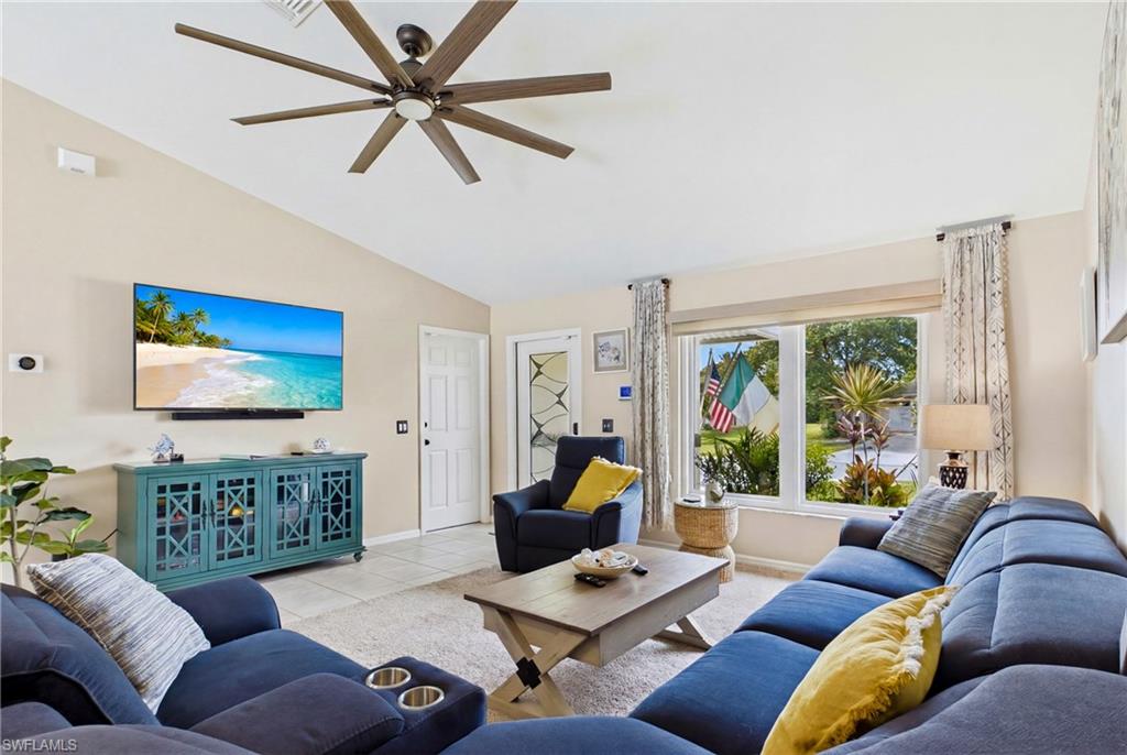 Soaring vaulted ceilings, neutral paint palette and lots of natural light throughout the home! Large wall spaces to showcase your art and beautiful plant shelves add additional charm to this already charming home!