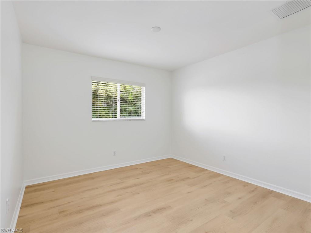 Light wood-finish flooring throughout