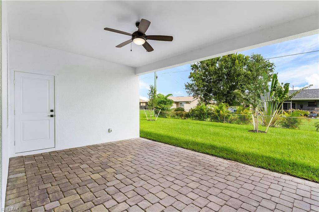 View of patio with a ceiling fan