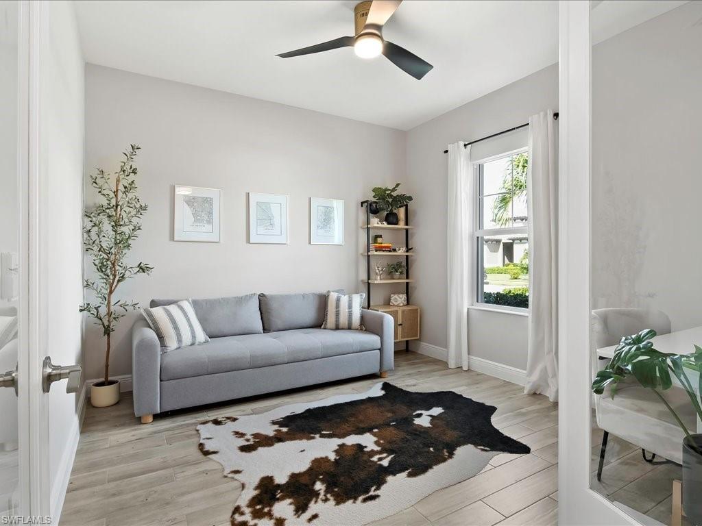Previously furnished open den.