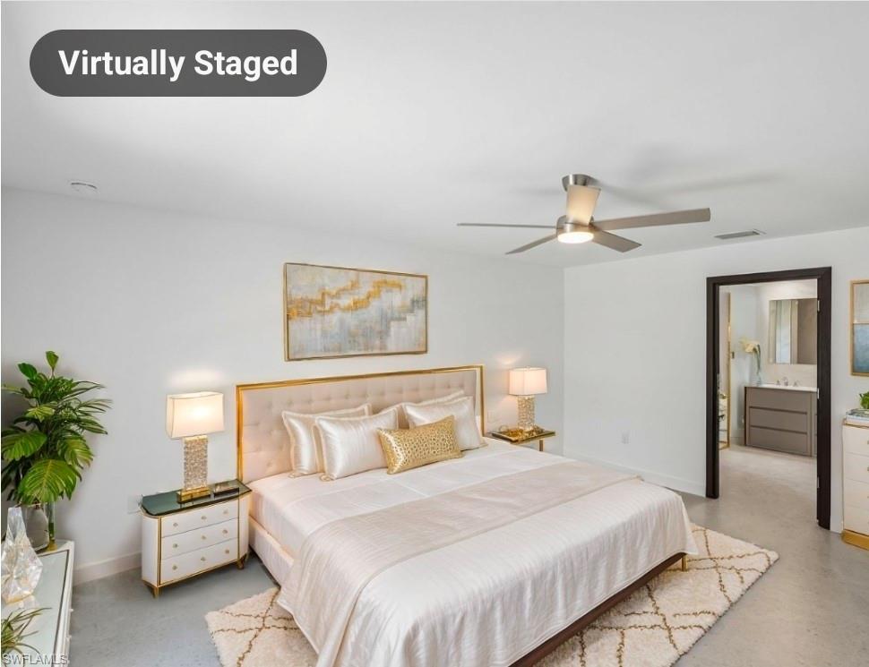 Spacious bedroom with concrete flooring, a contemporary ceiling fan, and recessed lighting