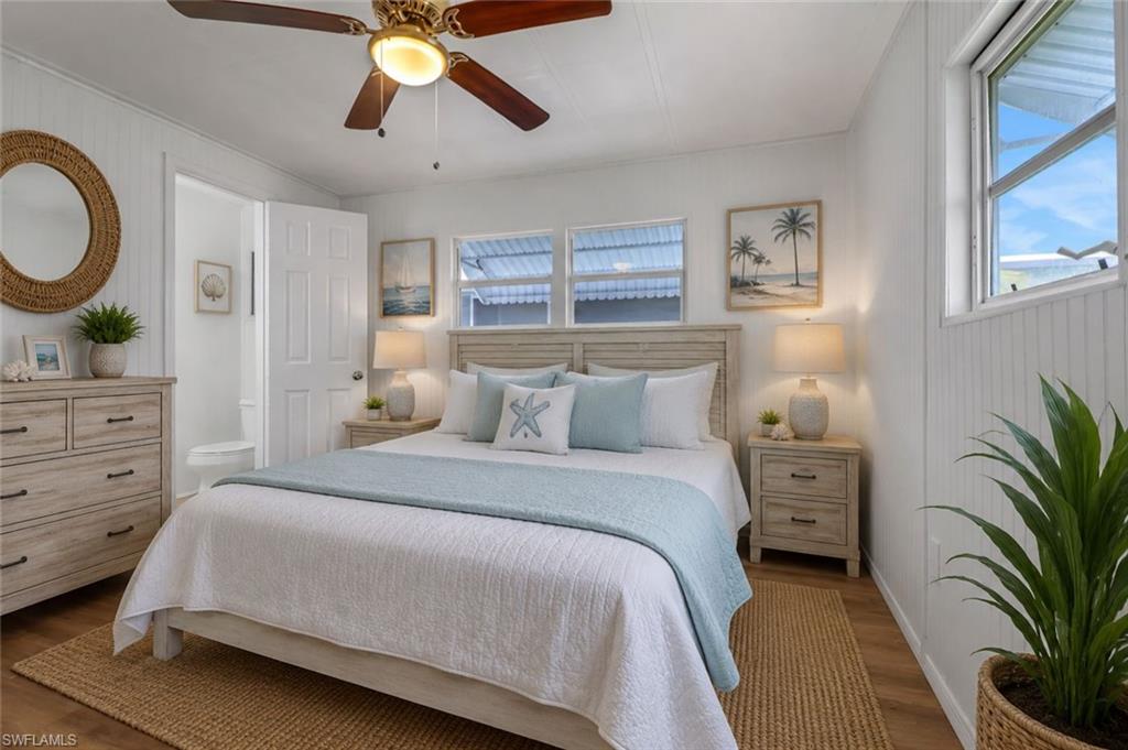 Virtually Staged Primary Bedroom with In-Suite Half Bathroom