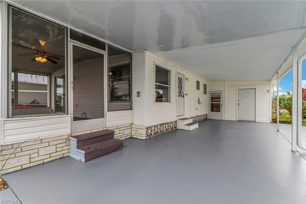 Covered Carport with Enough Space for a Car & Golf Cart!