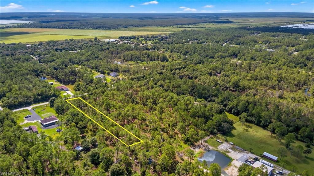 Aerial view of property's location with property parcel outlined