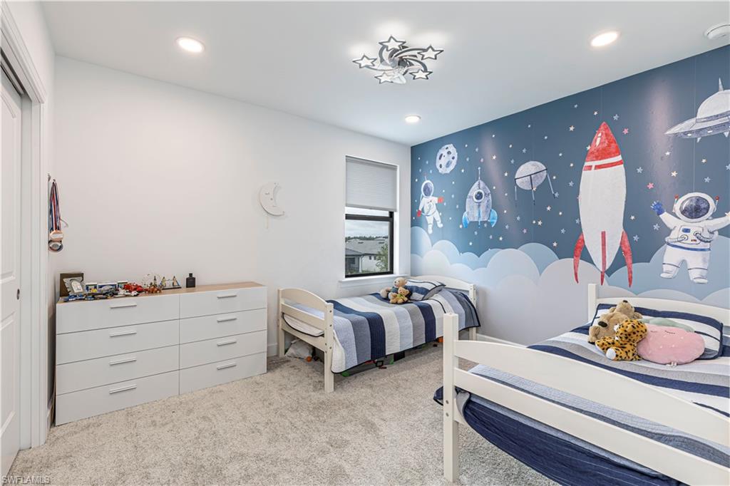 Bedroom featuring carpet and recessed lighting