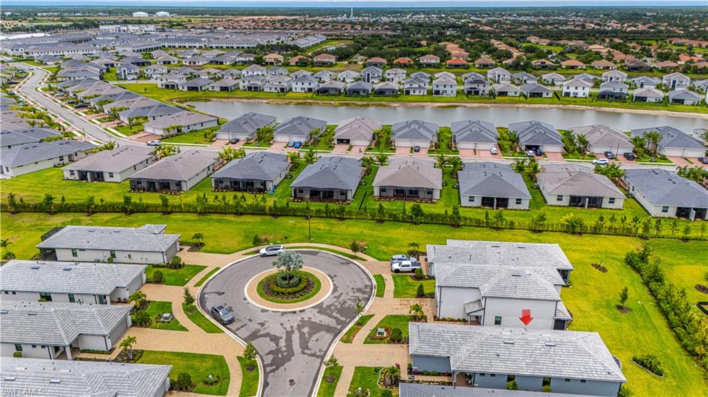 Aerial view of residential area with a large body of water