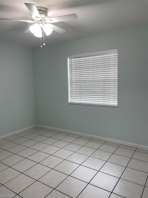 Light-toned tile flooring throughout