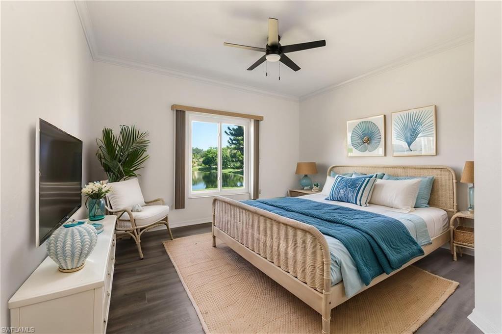Spacious room featuring a large window with direct water and foliage scenery