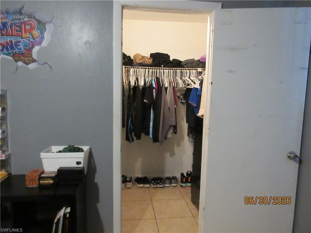 WALK IN CLOSET IN CHILDRENS ROOM
