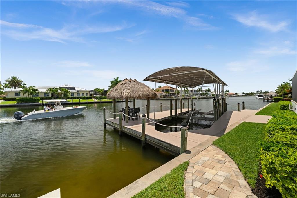 Dock with tiki and 30,000 lb covered boat lift
