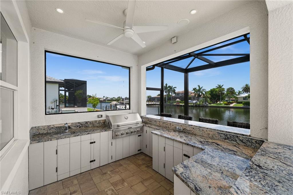 Outdoor kitchen with built in propane grill