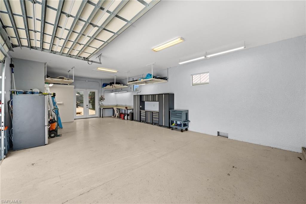 Soaring ceilings in the mancave give plenty of space to add lifts