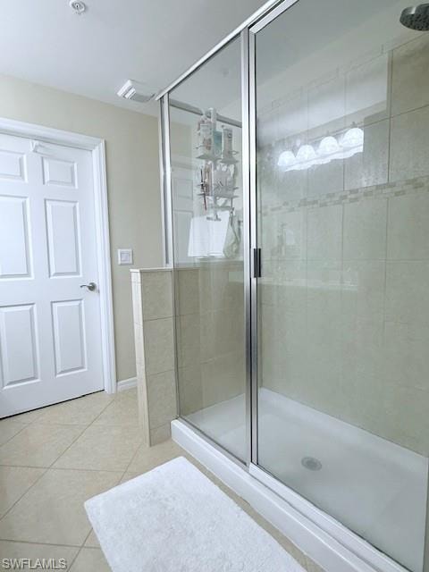 Master en-suite bathroom with large glass enclosed shower