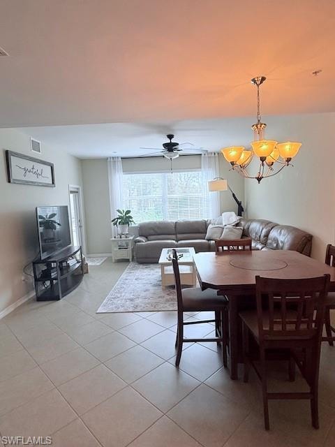 Open-concept living space where comfortable seating & dining, all bathed in natural light from large windows.