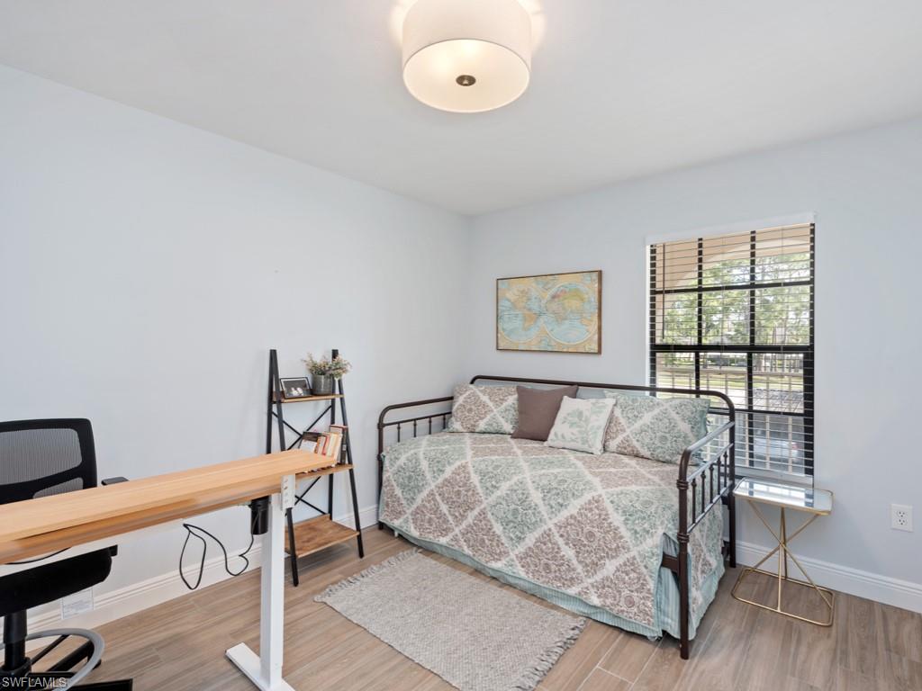 Bedroom featuring hardwood / wood-style flooring