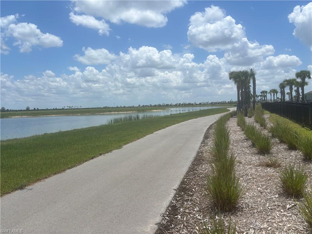Walking path right off backyard along Lake