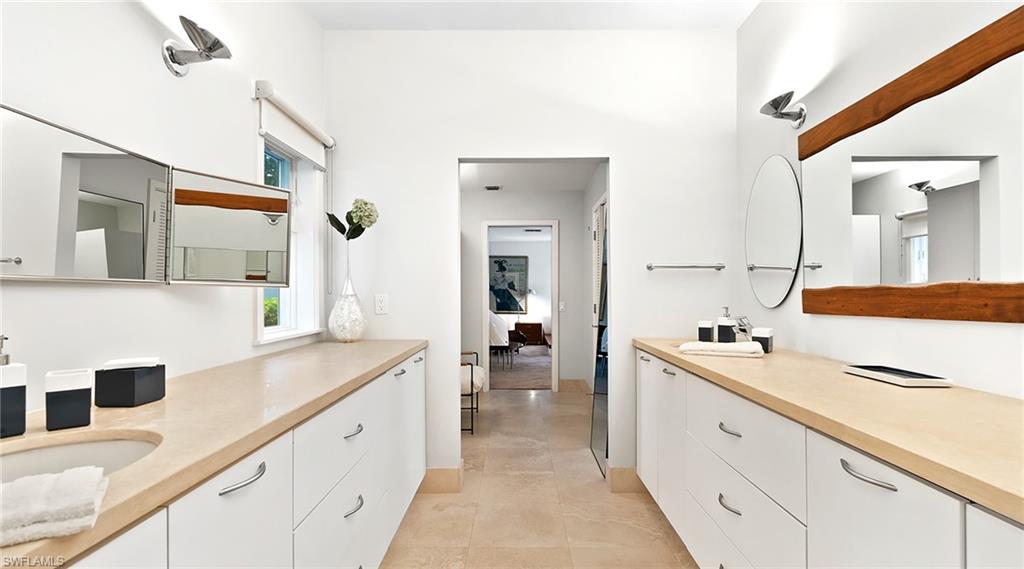 Ensuite bathroom featuring vanity