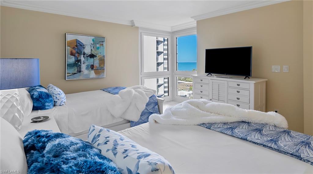 Bedroom featuring ornamental molding