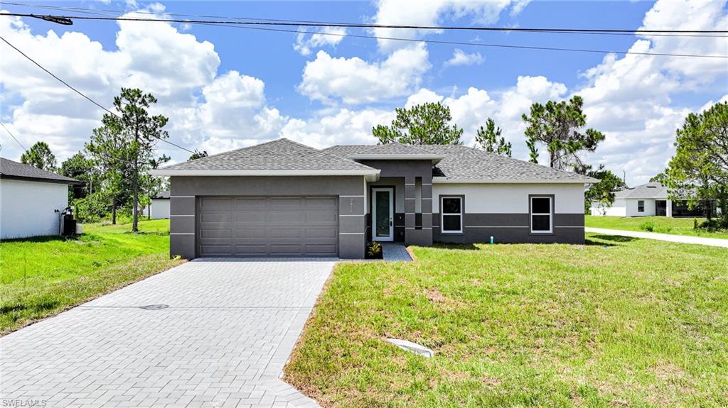 Lovely Brand New Corner Lot 3 Bedroom (Plus Private Home Office/Den/Or 4th Bedroom) 2 Bathroom/2 Car Garage Home In Lehigh Acres, FL!