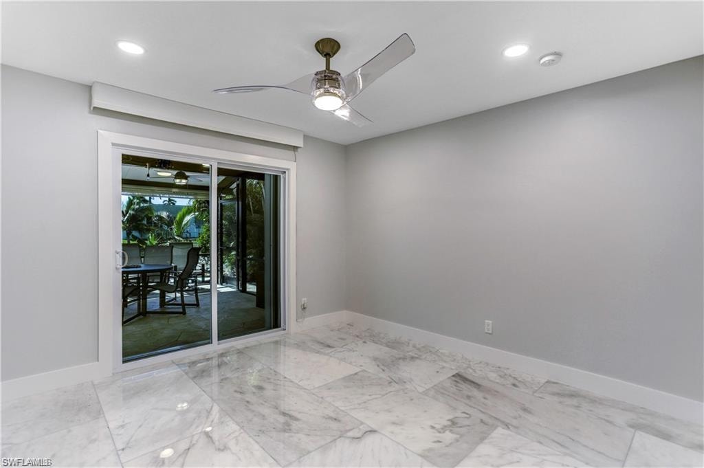 Back guest bedroom with sliders out to the lanai, Pfiefer/Somfy electric shades.