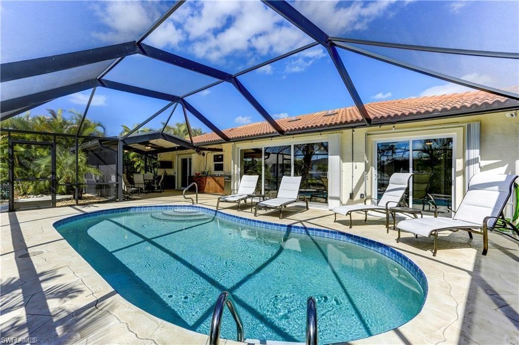 Large pool, screen enclosure will be extended to the second floor.