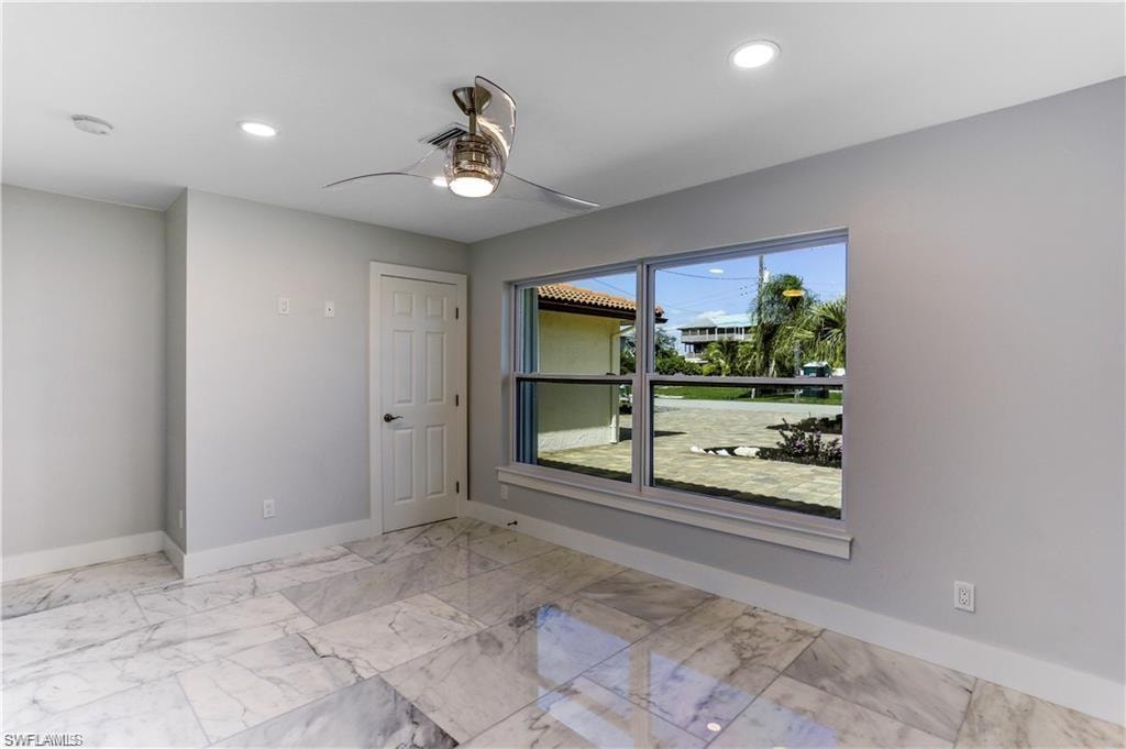 Front guest bedroom with large picture window.