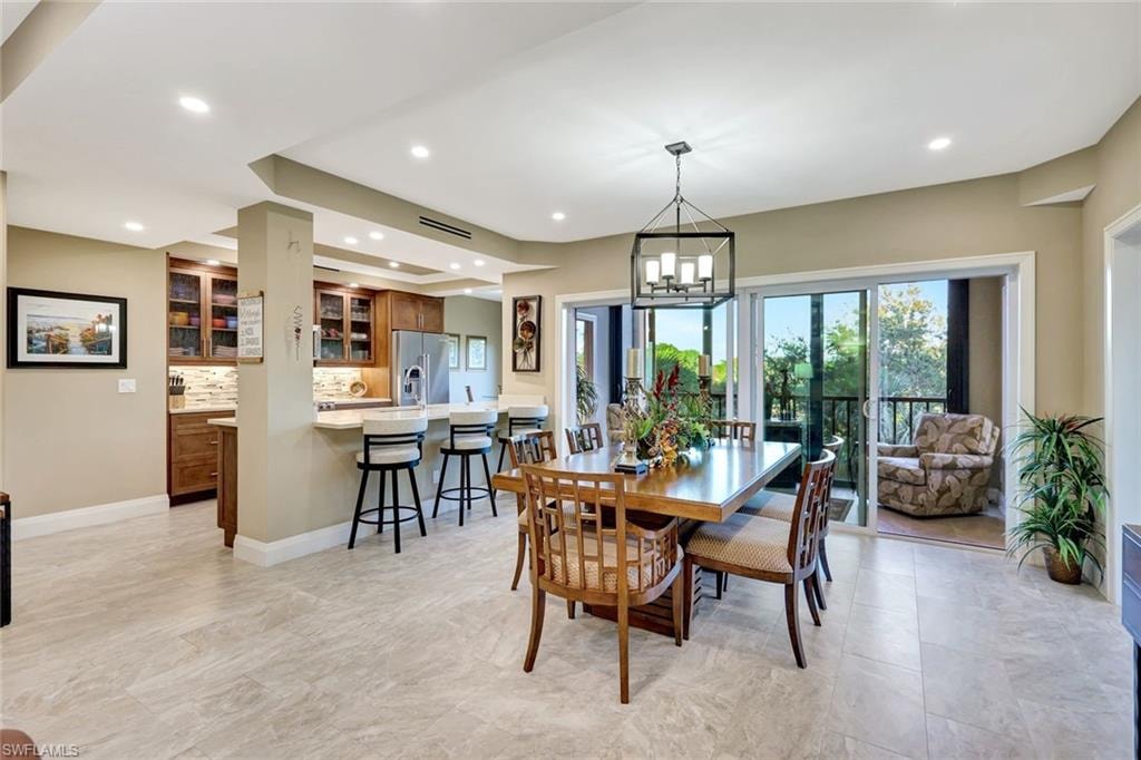 Renovated condo has a spacious feel with view to surrounding Interlachen grounds.