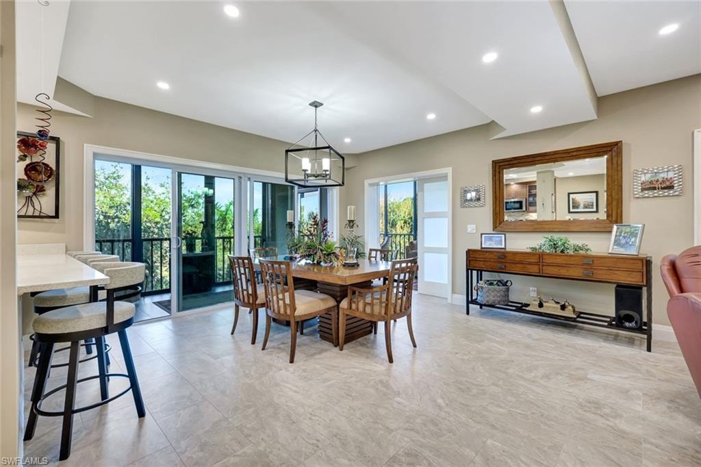 Open great room with two office or den sleeping areas and a enclosed lanai