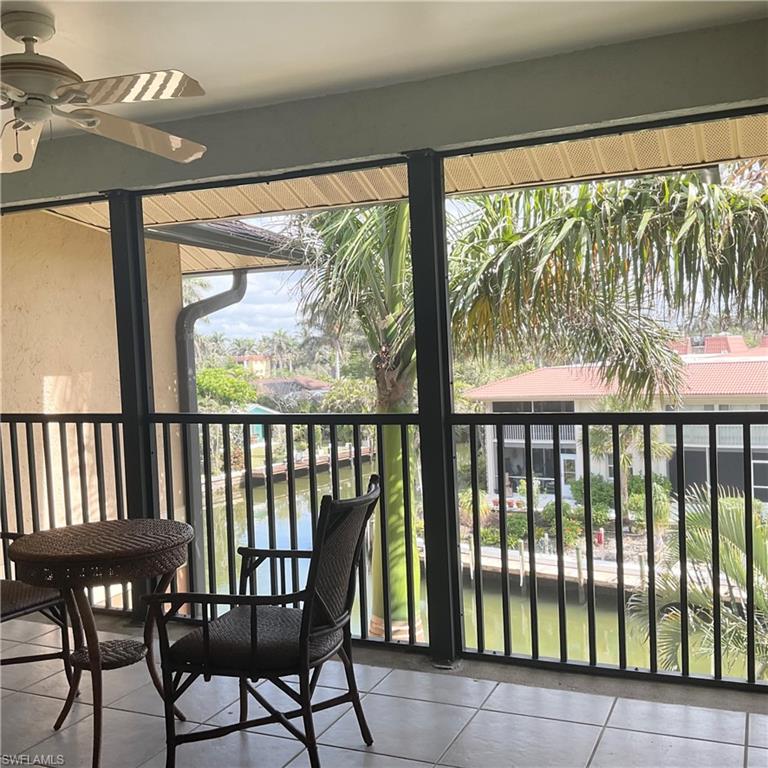Lanai off of primary bedroom featuring a water view