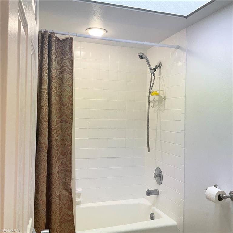 Primary bathroom with shower / bath combo