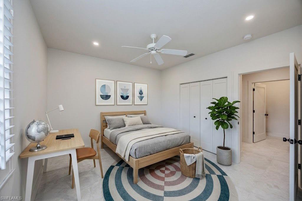 Virtually staged 2nd guest bedroom showcasing the room's spacious layout and design potenial