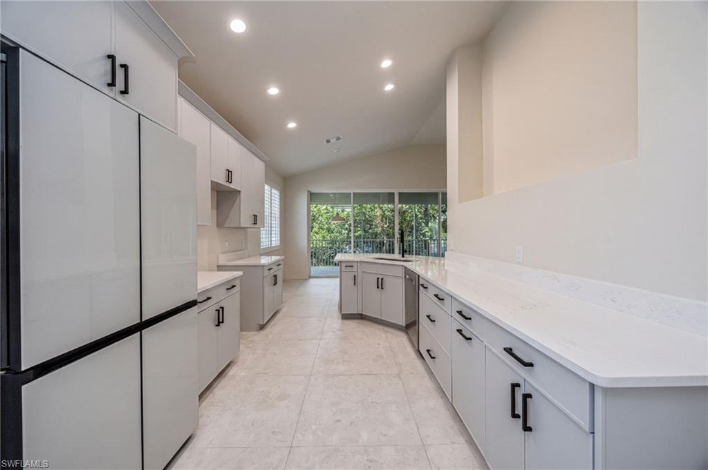 Contemporary reimagined kitchen featuring new high-end appliances, sleek finishes, and modern style