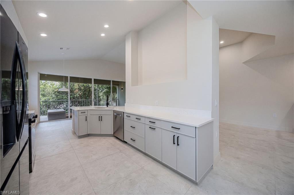 Premium kitchen features include soft-close drawers and custom pull-out cabinetry