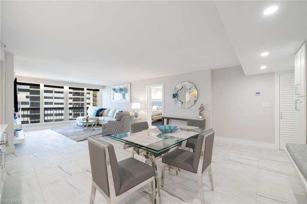 Dining area featuring light tile patterned floors