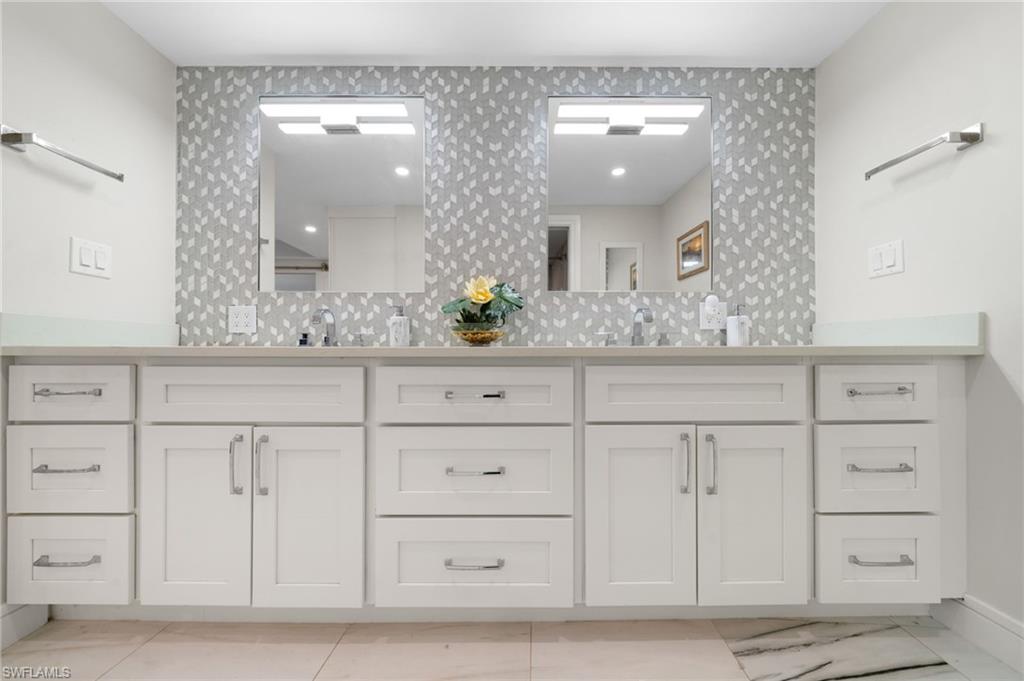 Bathroom with vanity and tile patterned flooring