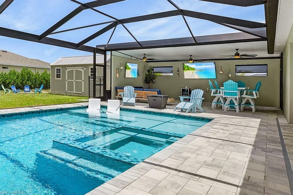 Truly a resort-style outdoor living space.  The under roof lounge overlooks the pool and connects perfectly to the oversized back yard with extra depth for games and sports on the grass.  The perfect entertaining home!