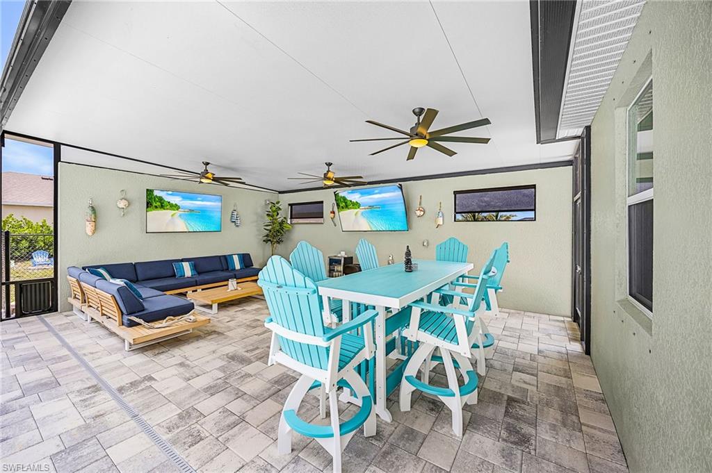 Massive covered cabana designed for year-round entertaining, offering shade, comfort, and ample space for outdoor gatherings.
