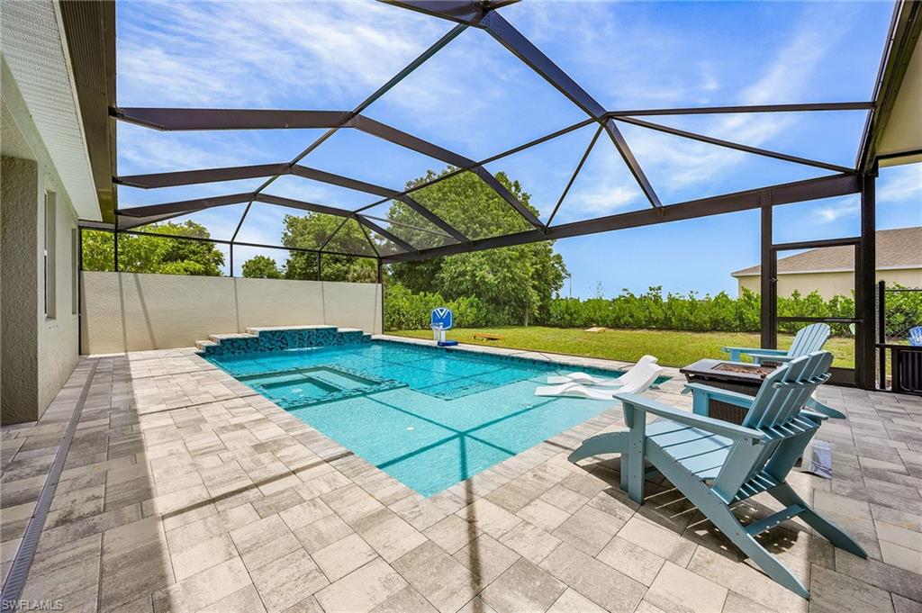 Incredible custom heated saltwater pool and oversized spa—highly desirable features for buyers seeking a luxury Cape Coral pool home.   Fully automated with use of a smartphone app.  Turn the spa on, hit the lights, turn on the waterfall, all from your phone.