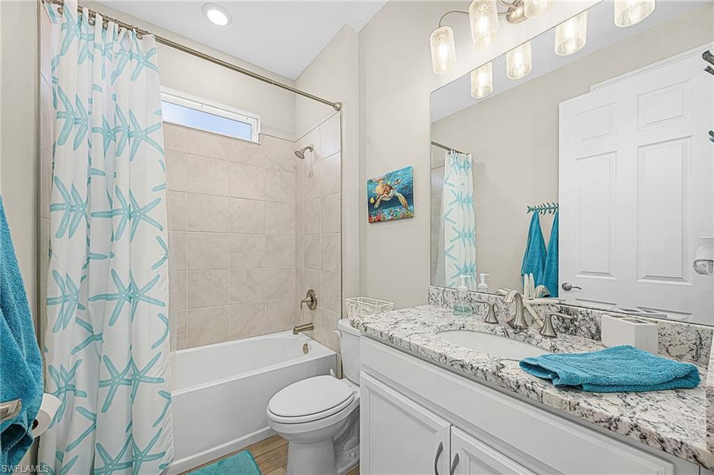 Full guest bathroom featuring modern finishes, updated fixtures, and a clean, contemporary design ideal for everyday use or accommodating guests.  Located between the 2 guest bedrooms.