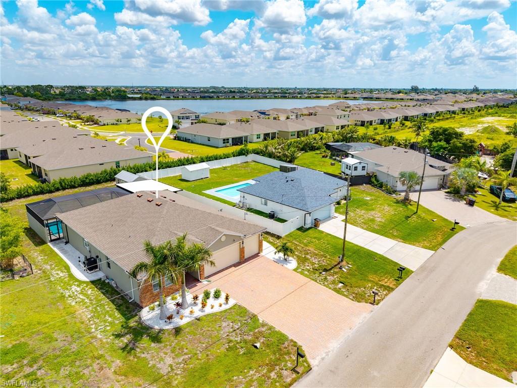 Quiet residential street with newer homes throughout the neighborhood, offering a peaceful and desirable Northwest Cape Coral location.
