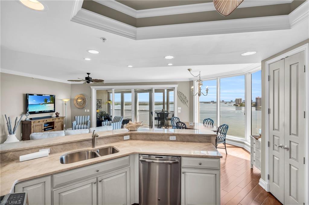 View from kitchen of the fabulous views, dining area, lanai and family area