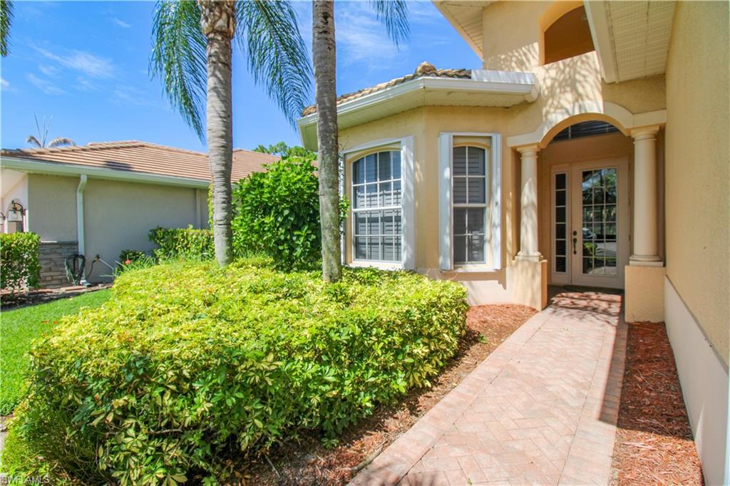 View of exterior entry featuring french doors