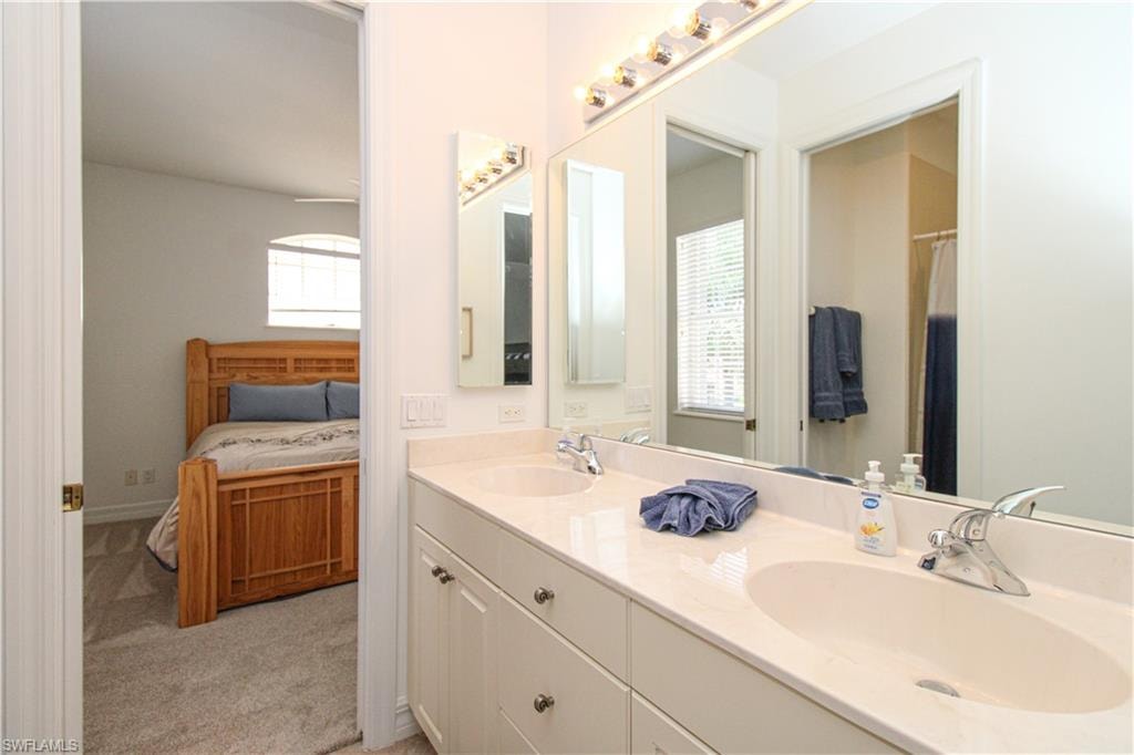 Bathroom featuring dual vanity