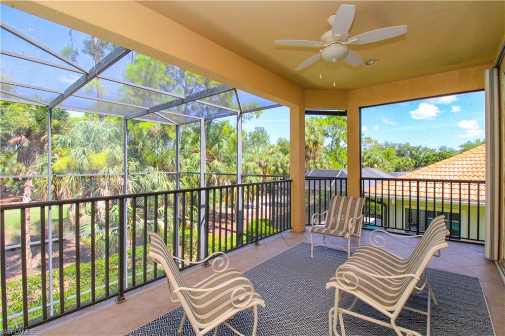 Sunroom featuring ceiling fan