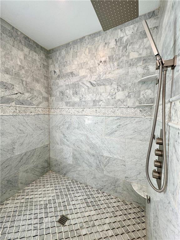 Bathroom with tiled shower