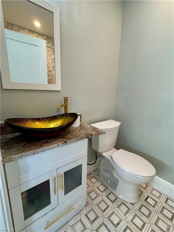 Bathroom with vanity and toilet
