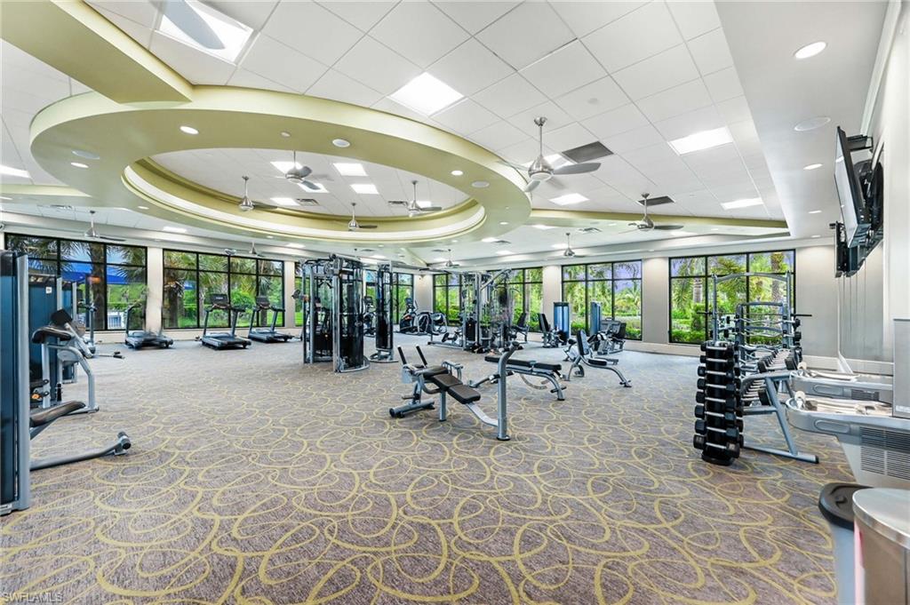 Fitness center featuring multiple workout machines