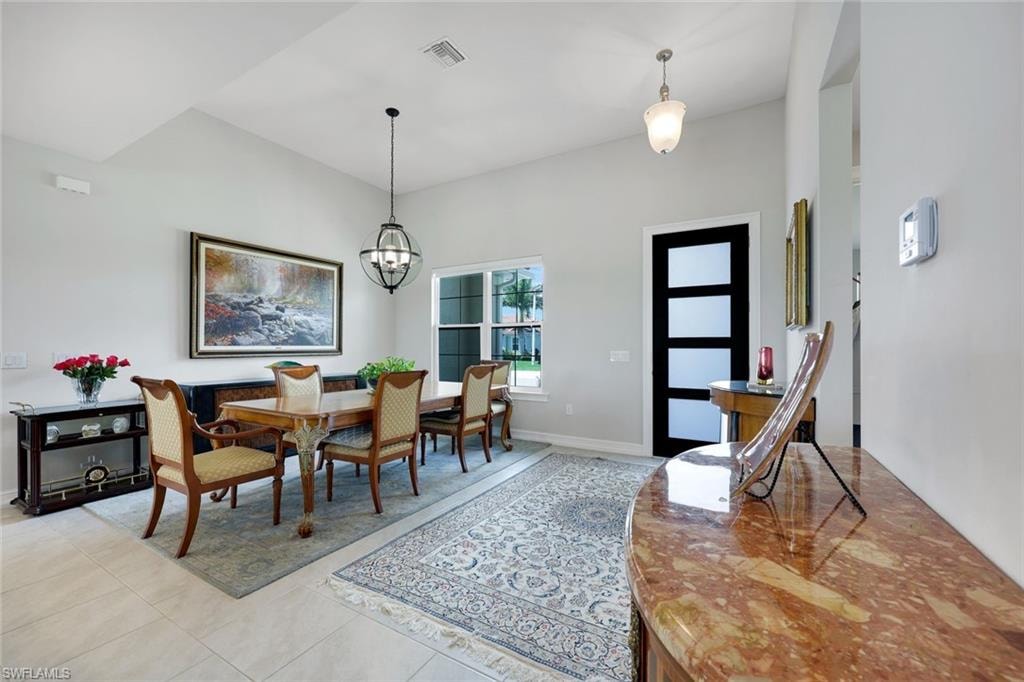 FORMAL DINING AREA WITH HIGH CEILINGS