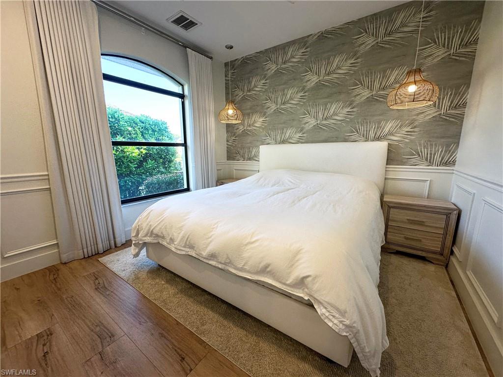 bedroom featuring wood-type flooring